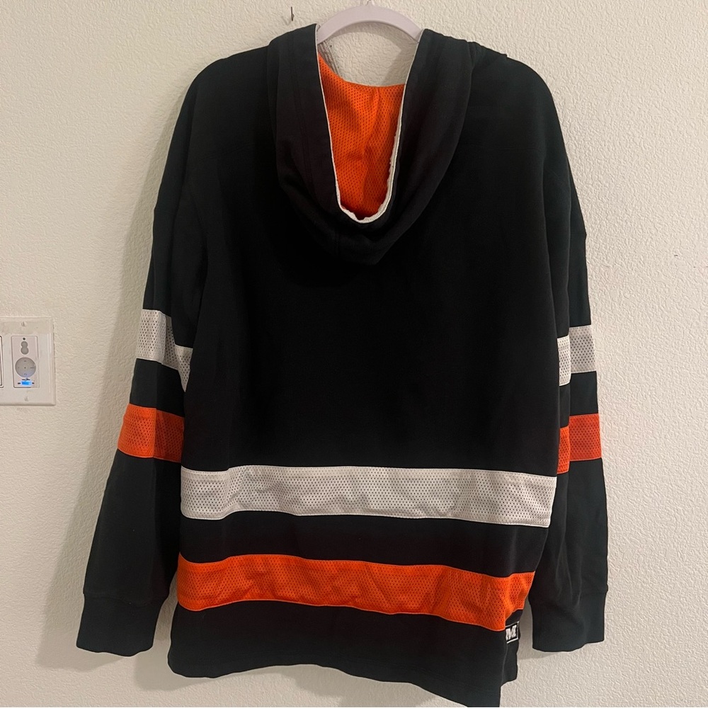 CCM Anaheim Ducks Lace Up hoodie sweatshirt black and Orange Men's - Picture 3 of 3